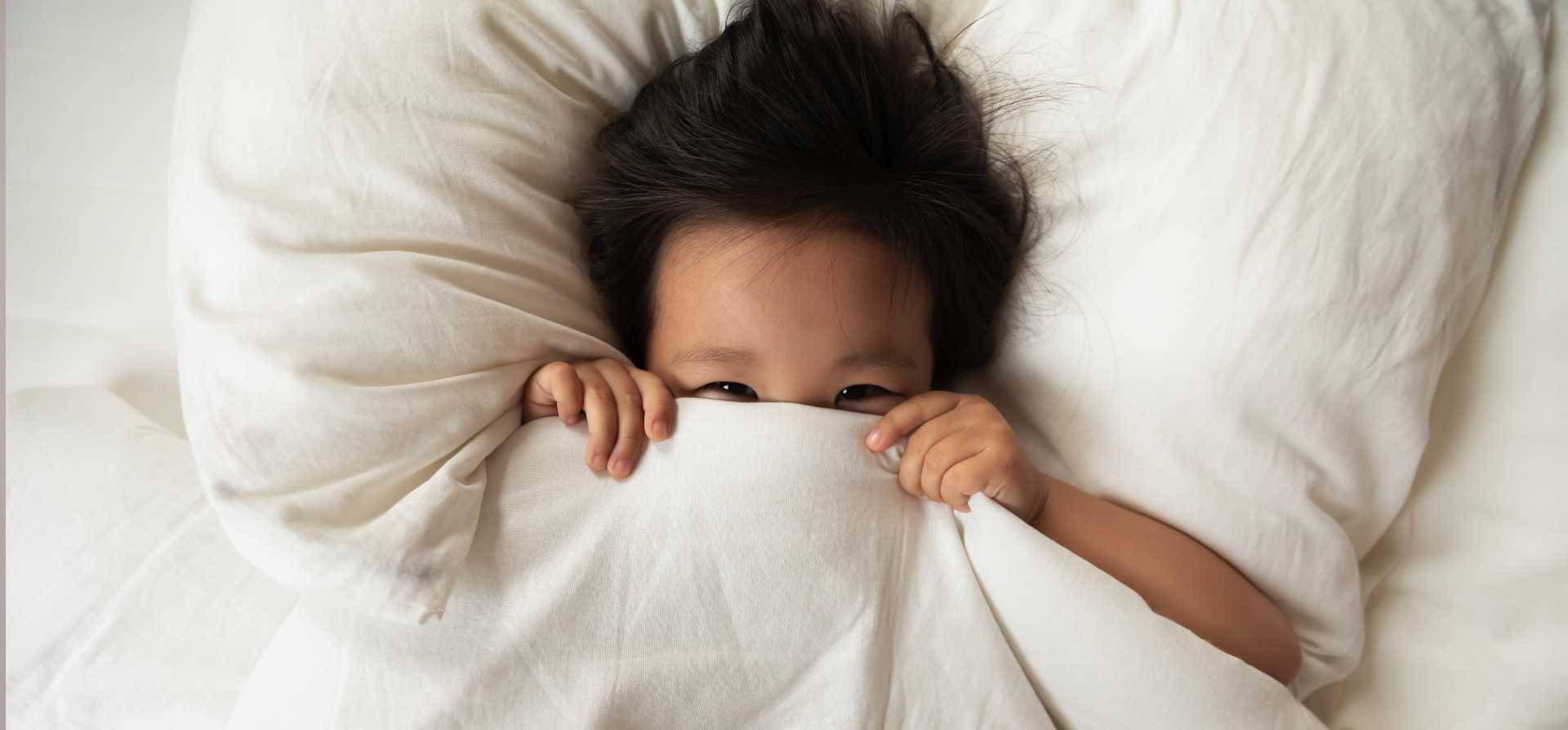 Child on a mattress assembled with Savaré adhesives